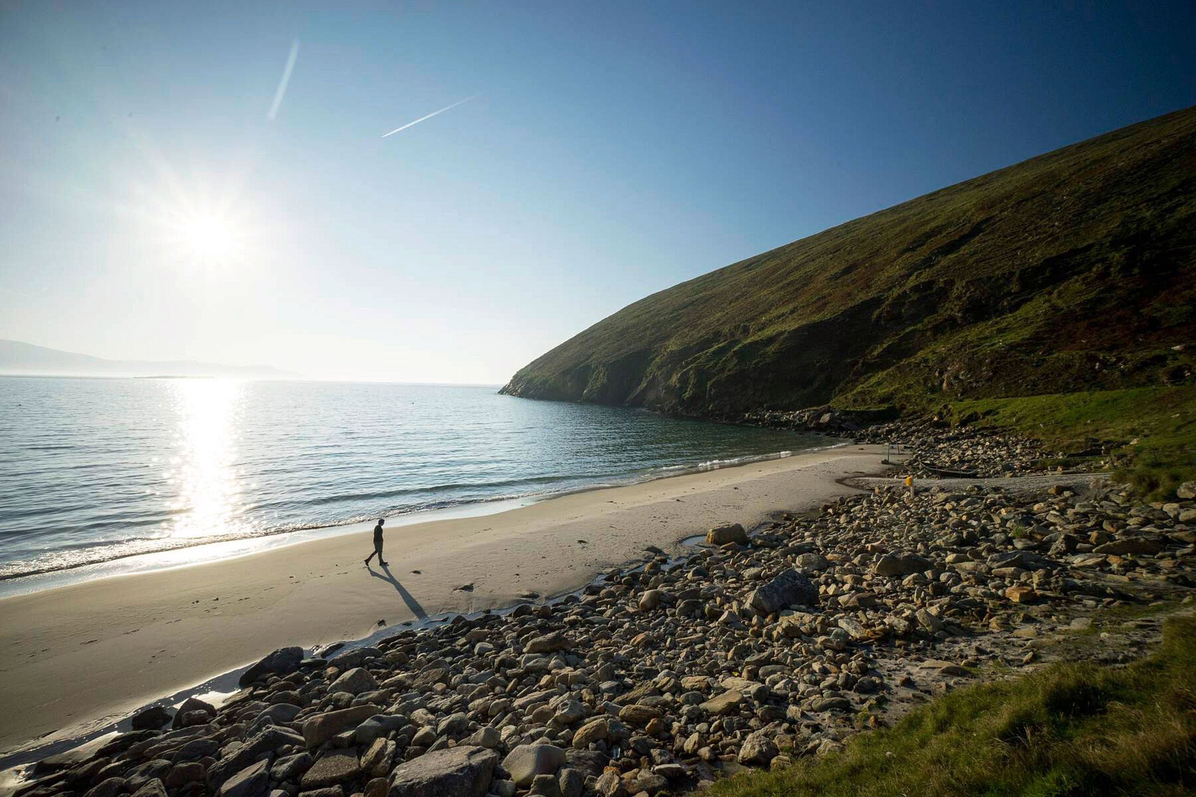 Image of walker on Keem Beach, Achill Island, County Mayo