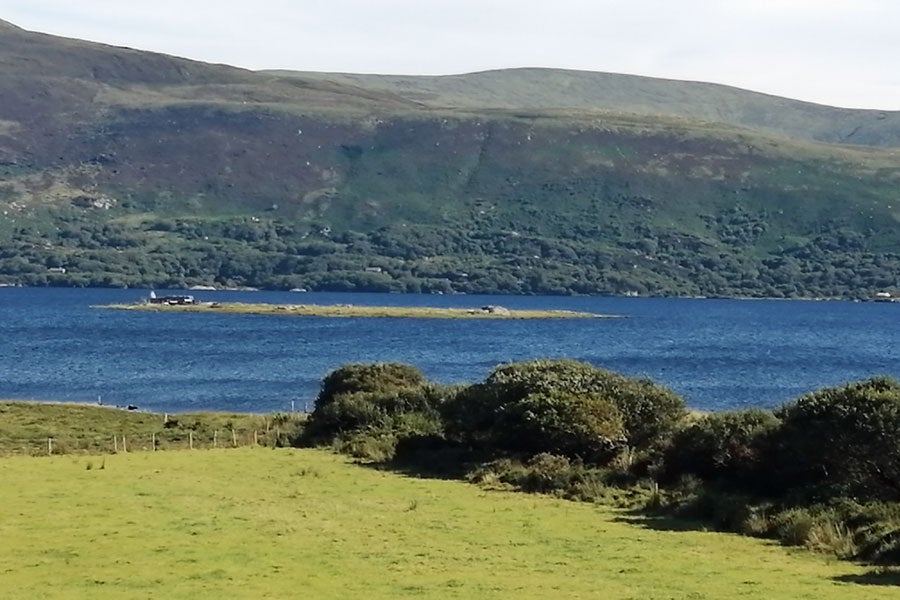 A view of Church Island and the medieval ruins in the middle of Lough Currane in Waterville
