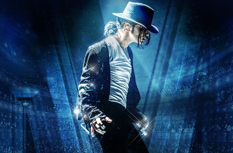 Michael Starring Ben - side view of person dressed like Michael Jackson with shiny jacket and brimmed hat.