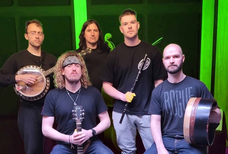 Group of 5 serious looking musicians with their instruments