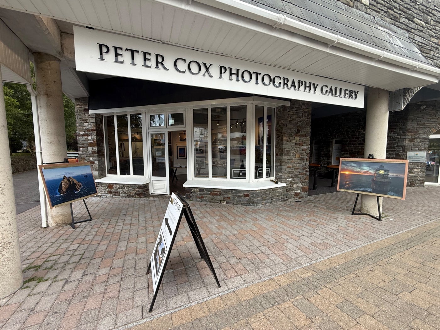 Exterior of a photographic studio with some prints on display outside