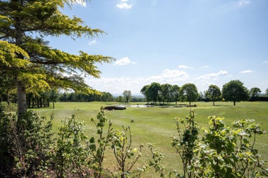 A view of a lake on a golf course