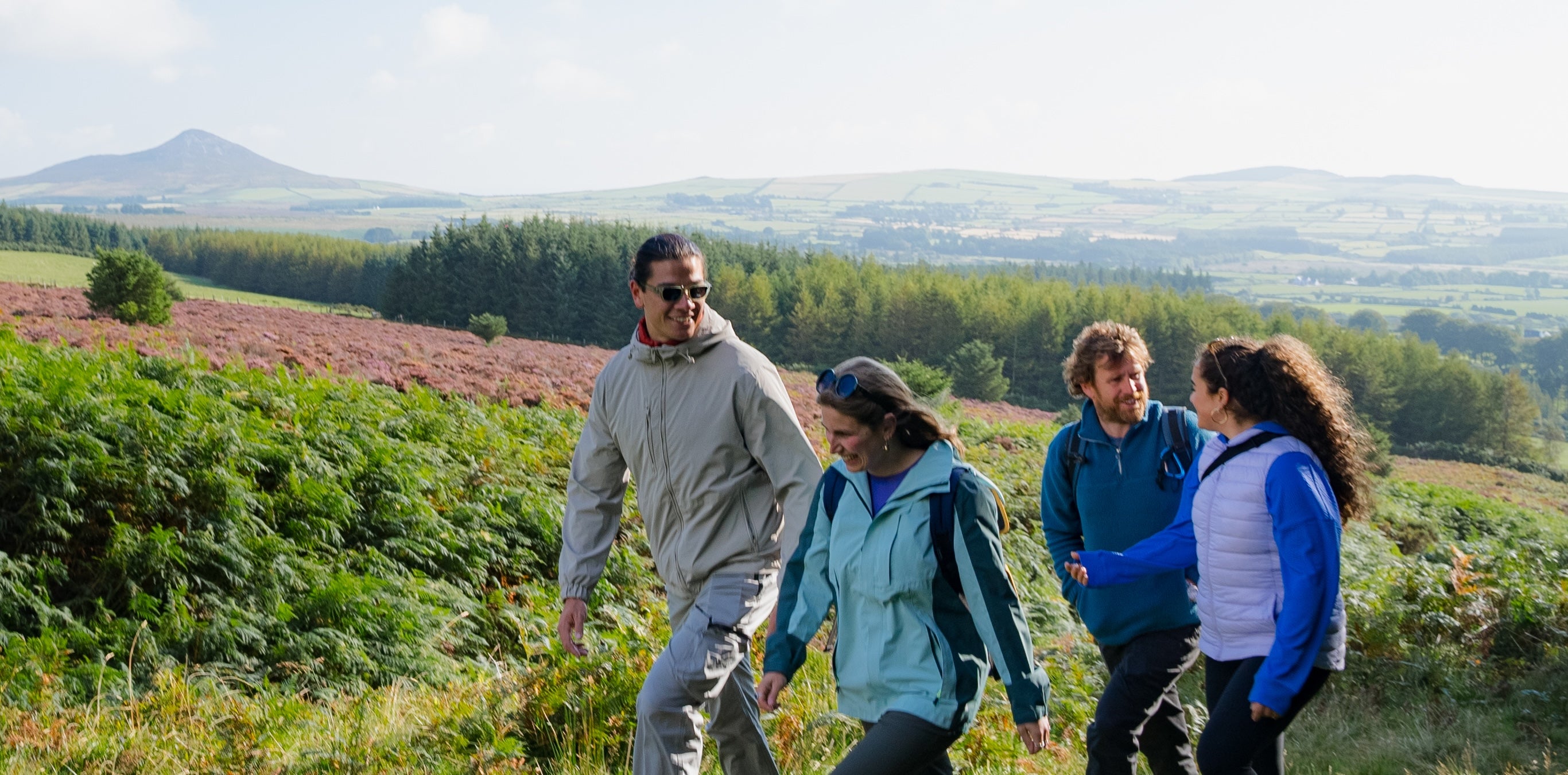 People hiking the Djouce Mountain Trail in the Wicklow Mountains