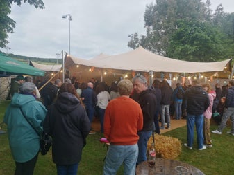 Shot of packed festival tent at Bowden concert