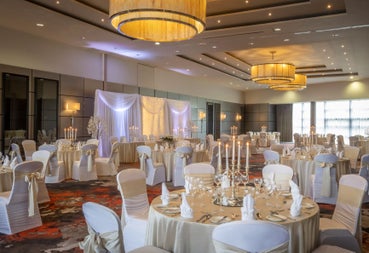 Function room with tables and chairs 