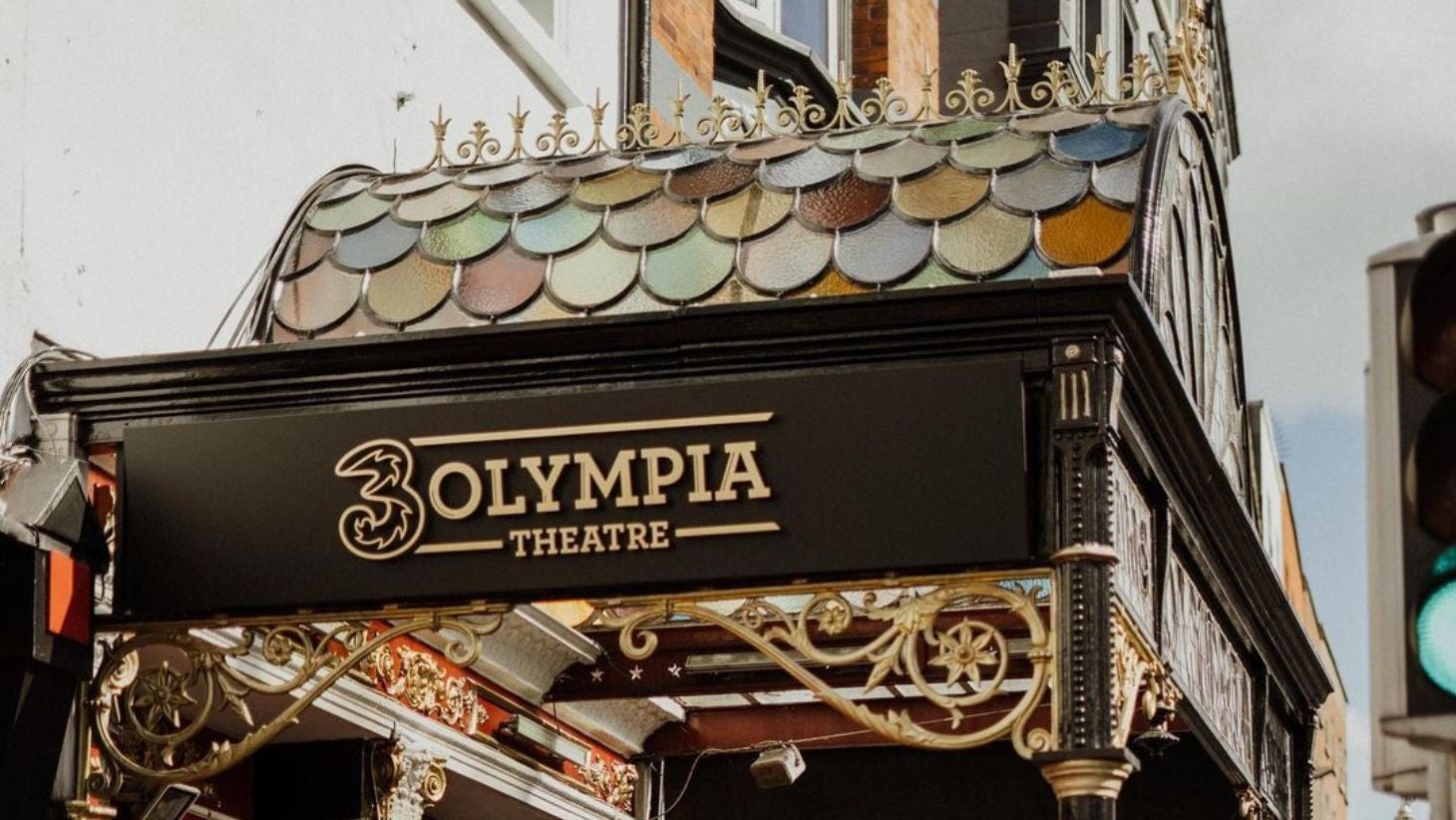 Signage for the 2Olympia Theatre and awning over the door.