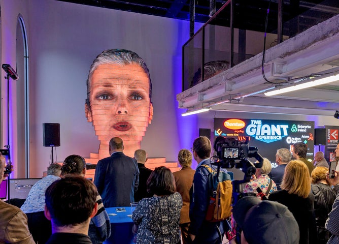 The Giant Experience crowd viewing the exhibition