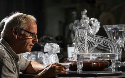 Quality inspection of crystal designs at The House of Waterford Crystal Factory