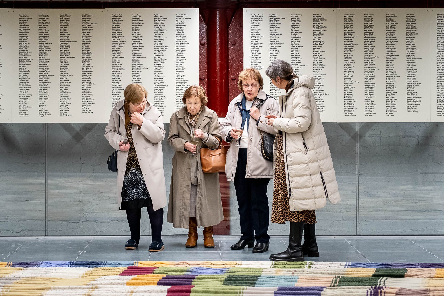 Knitters from The Knitting Map in 2005 visiting the Exhibition. The Knitting Map is an abstract map of Cork City over a calendar year combining weather data to generate colour, and the business of the city to generate complexity of stitch.