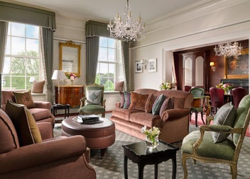 Lounge area with couch and chairs