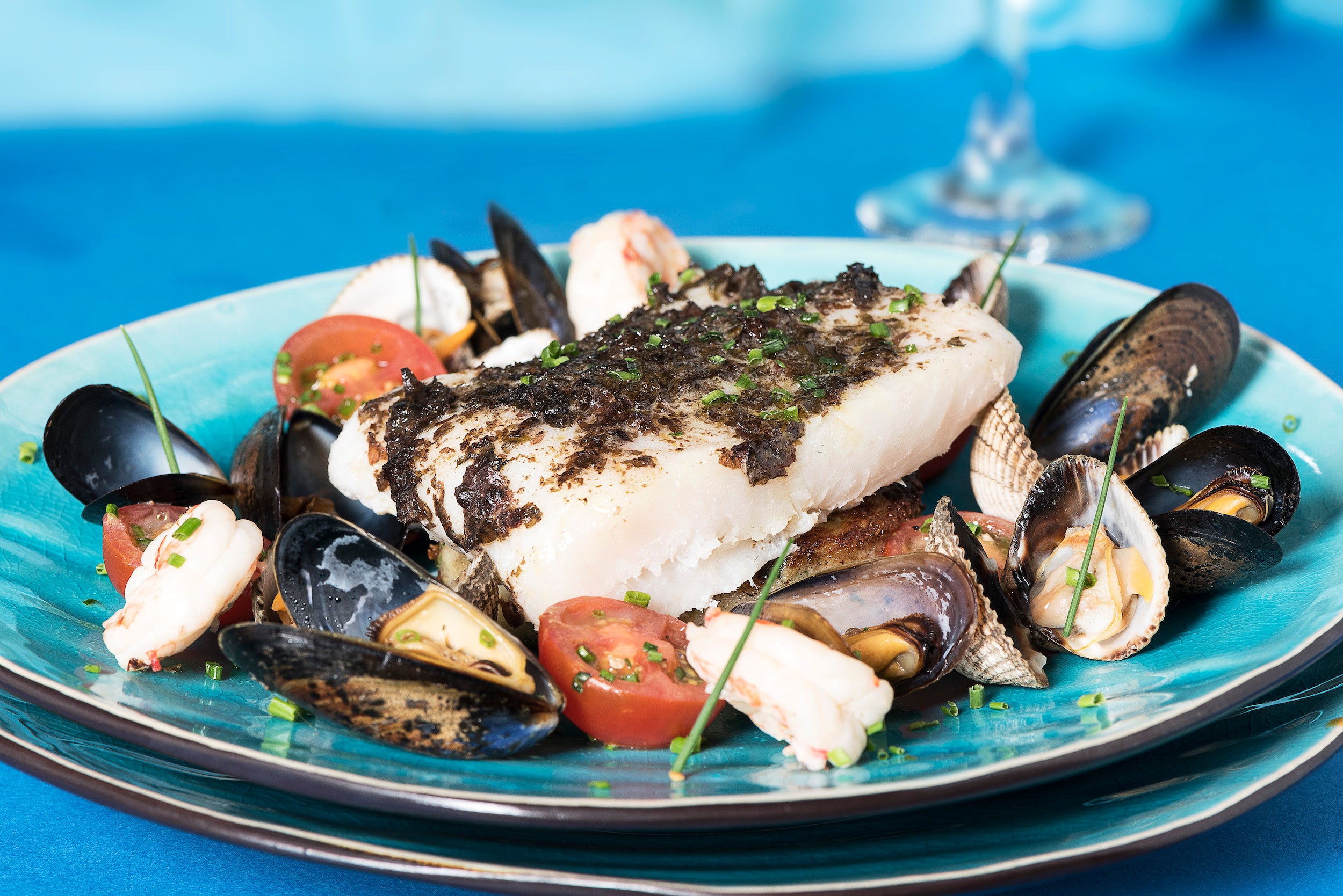 Seafood and shellfish served on a plate.