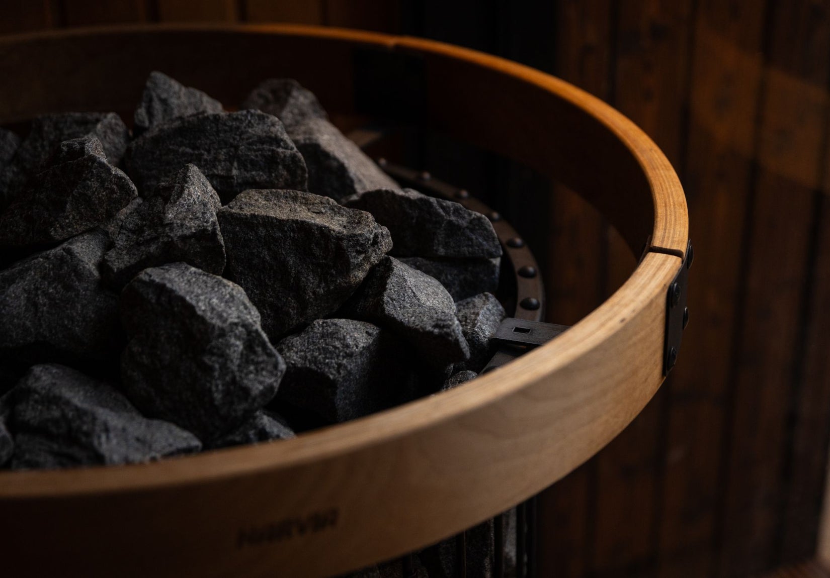 Close up of sauna stones on a sauna stove