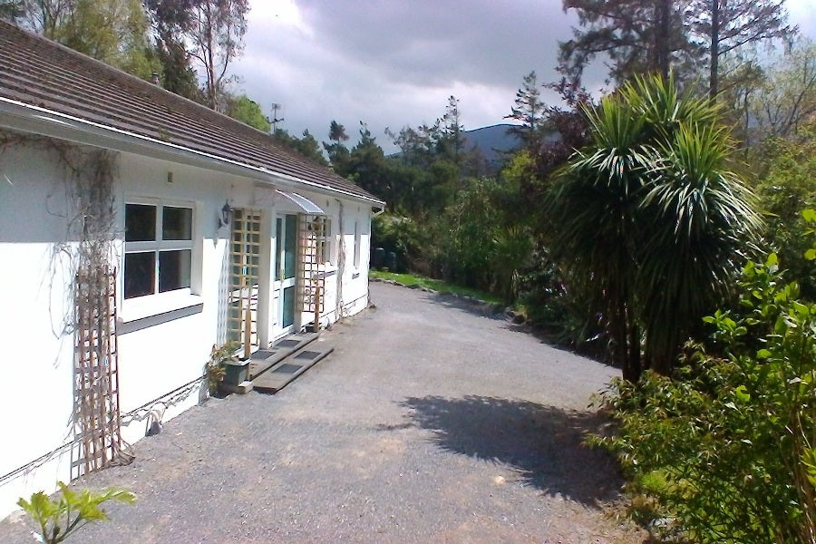Exterior of house with mountain view