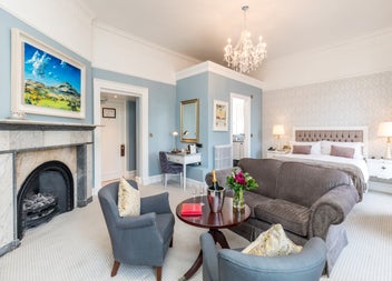 Bedroom with bed and seating area