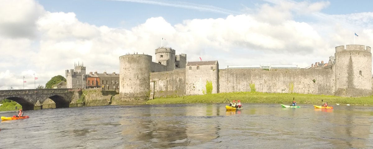 A view of King Johns Castle from the water on a kayaking tour with Nevsail Watersports