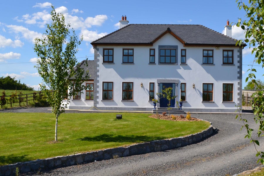 Front of house with green garden