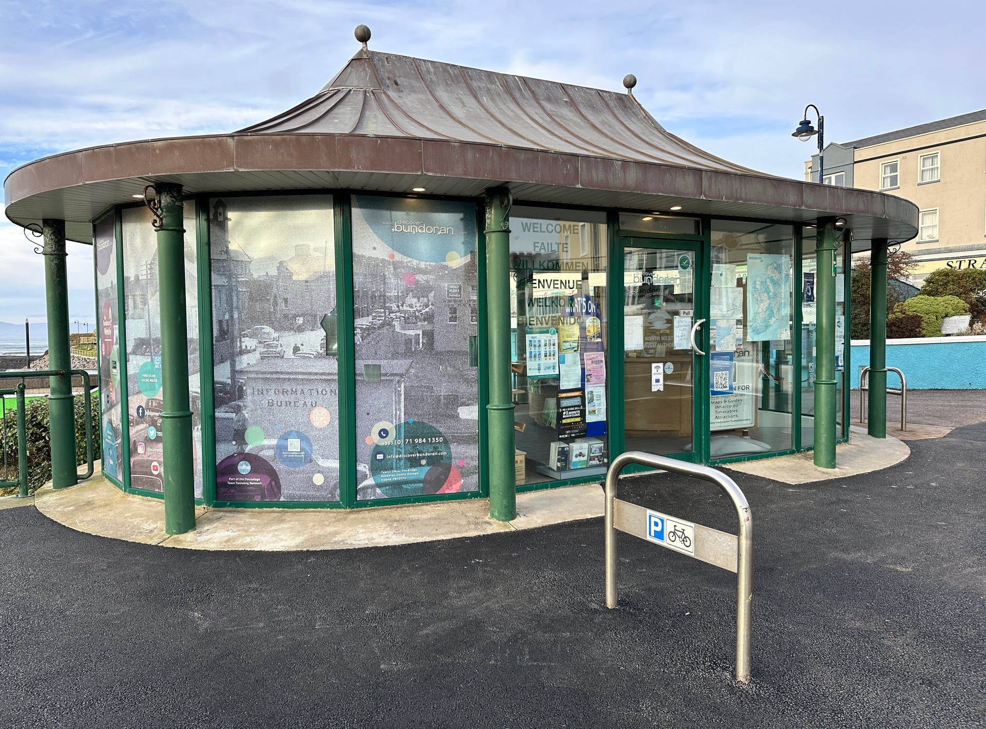The exterior of Bundoran Community Tourist Office with a bicycle rail outside it