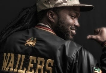 The Wailers for their 50 Years of Positive Vibrations tour, rear view of man's jacket with name embroidered on it