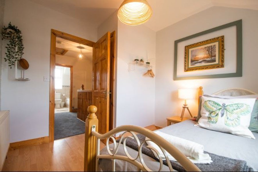 Double bedroom with white sheets