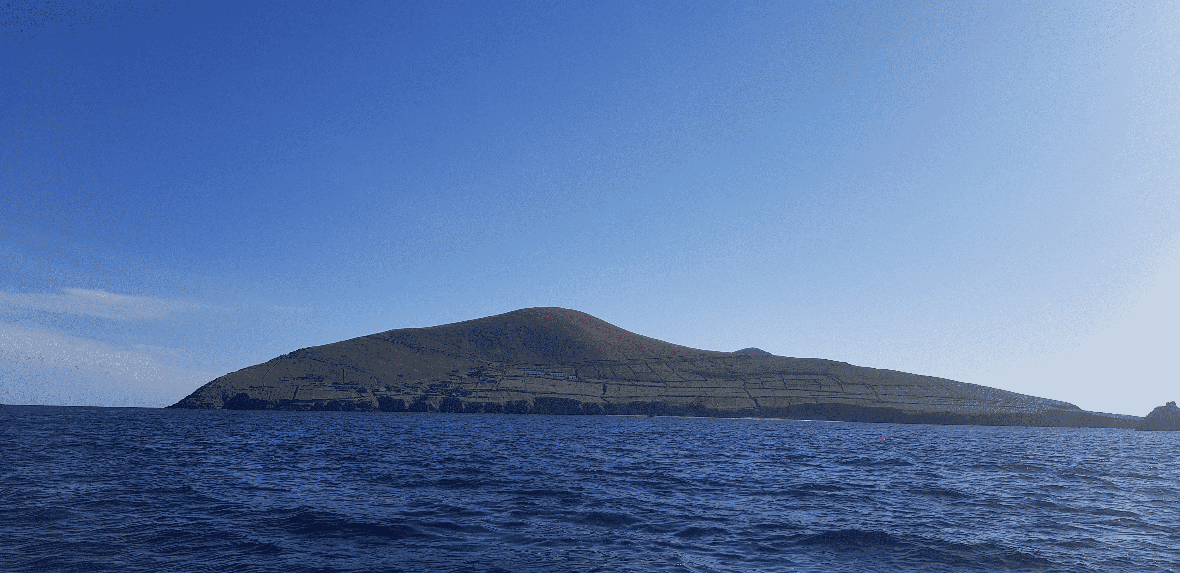 A photograph of great blasket island from across the water