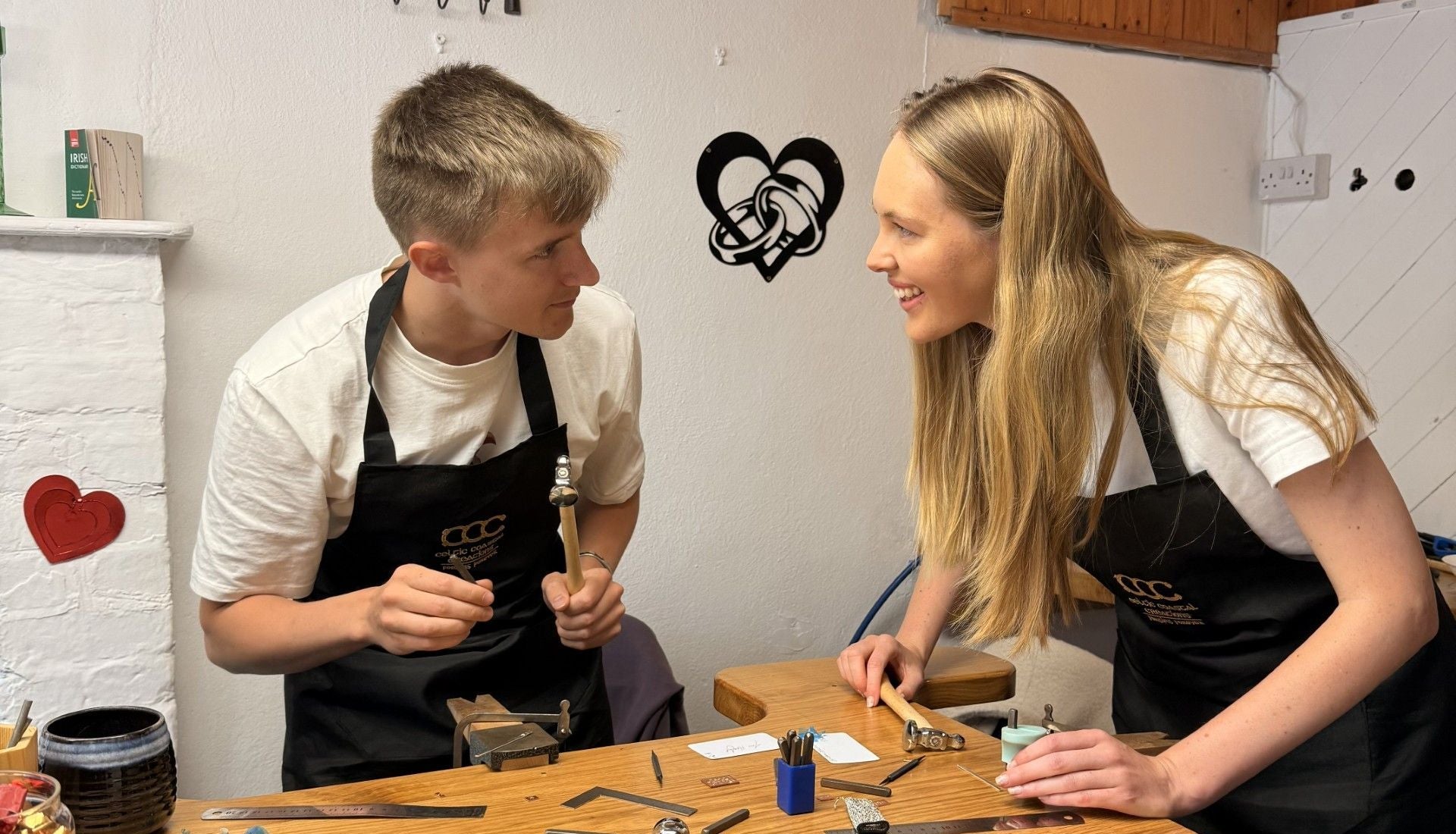 Couple making jewellery in a workshop