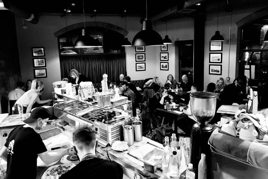 People enjoying their meals in the Bella & Brava Restaurant