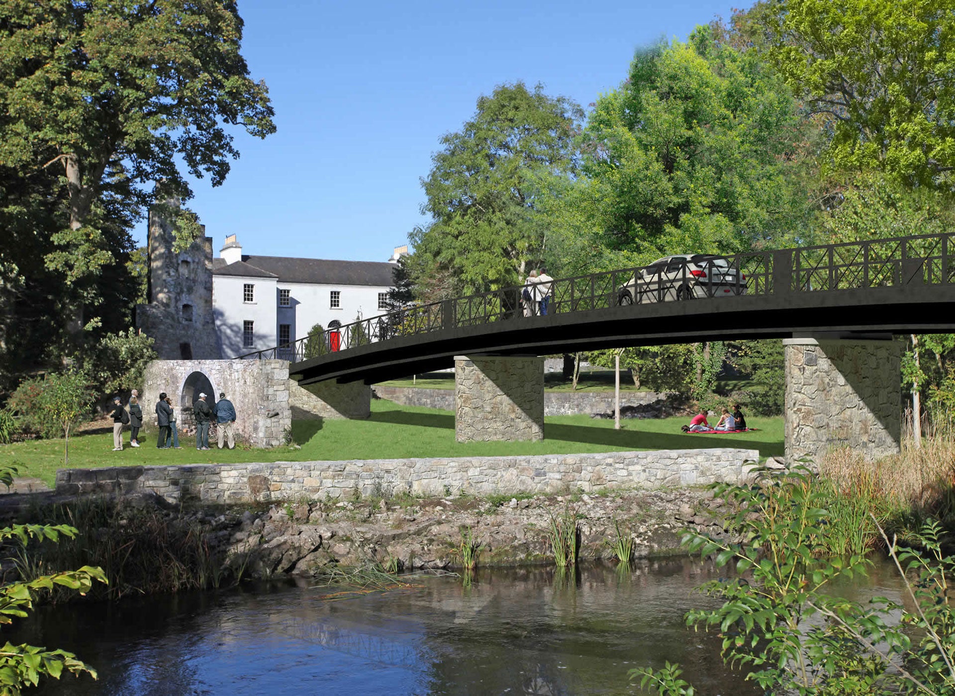 Castlecoote House exterior view with the river and bridge in the foreground