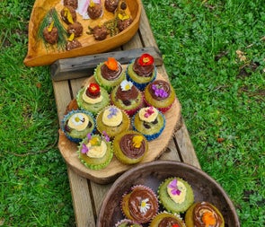 Three bowls of sweet treats at a picnic