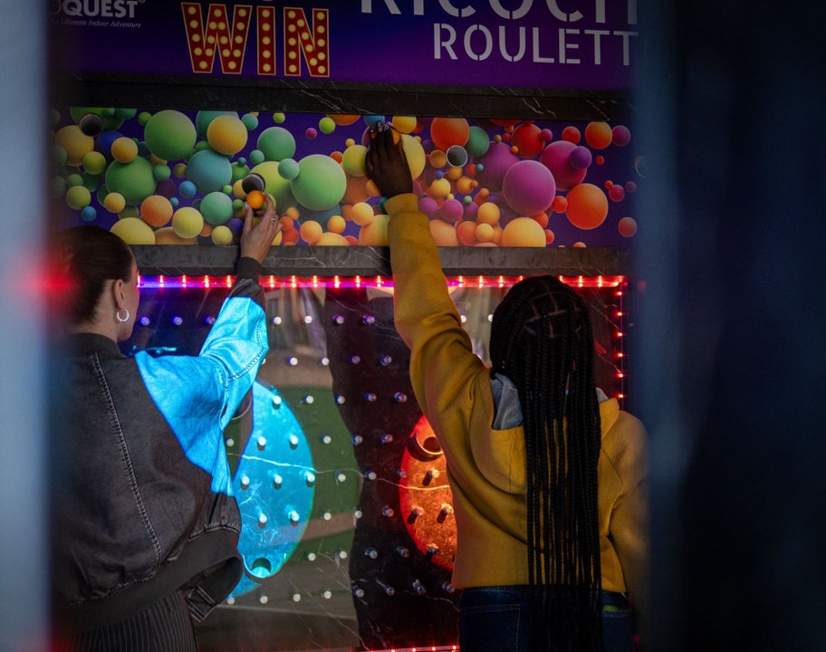 Two girls playing a ball game