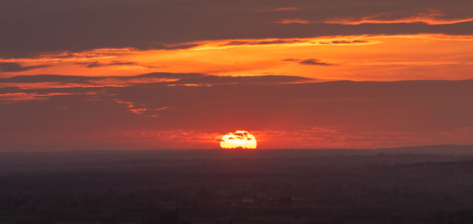 Hill of Uisneach Summer Solstice, a red sunset
