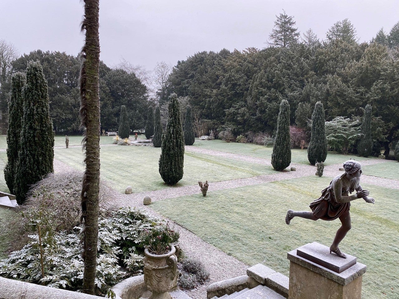 View of formal gardens with covering of frost.