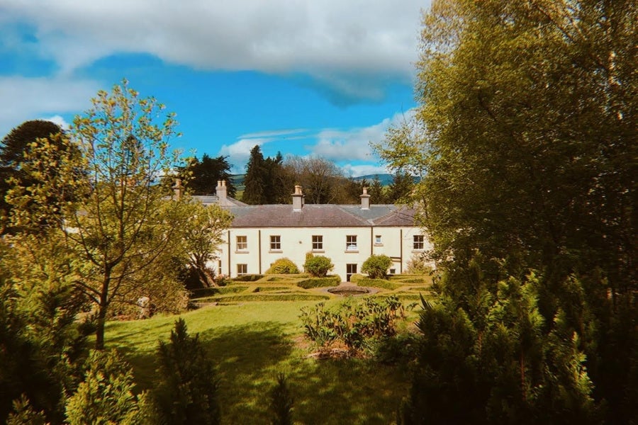 exterior of house with landscaped gardens