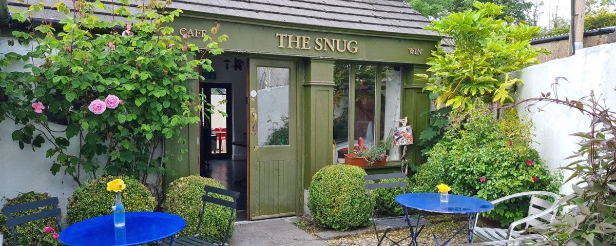 The Snug Cafe outdoor garden seating area