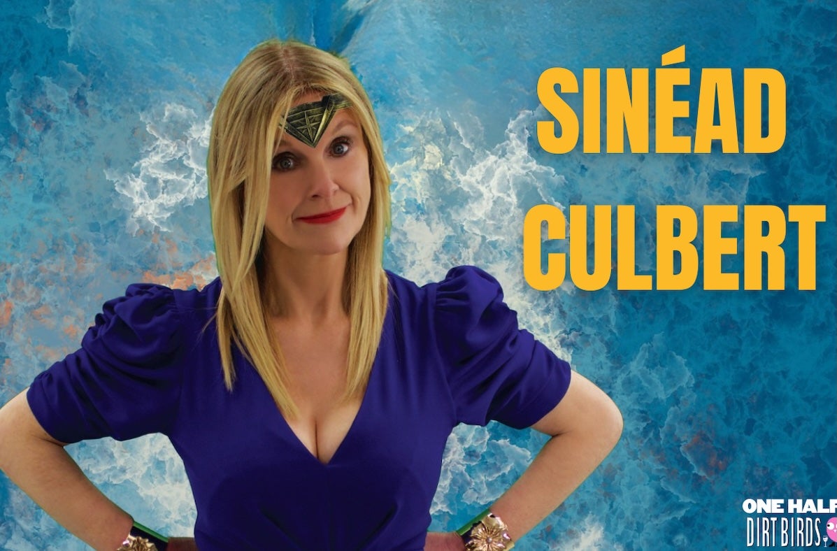 Sinead Culbert: I'm No Wonder Woman, a smiling woman standing with her hands on her hips