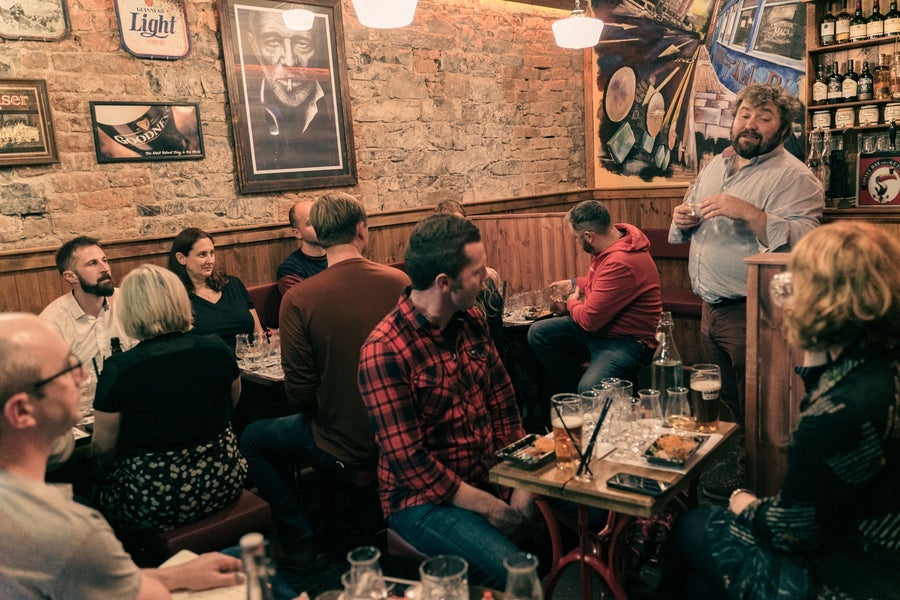 People enjoying a Limerick Whiskey Experience tour in Peggy's Parlour