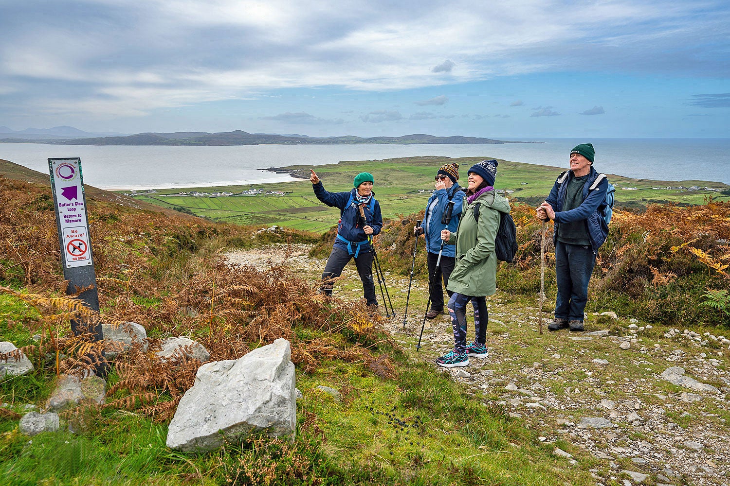 Solas Ireland Walks and Hikes guided group on a path overlooking the water