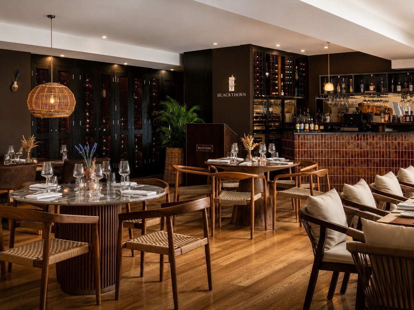 Dining room of a restaurant with chairs and tables set for service