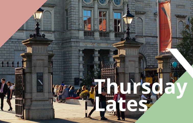 Crowds enjoying the sunshine outside the National Gallery of Ireland.