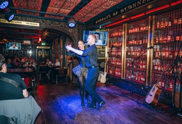 Guests enjoying traditional Irish dancing and live entertainment in Murray's Bar & Grill