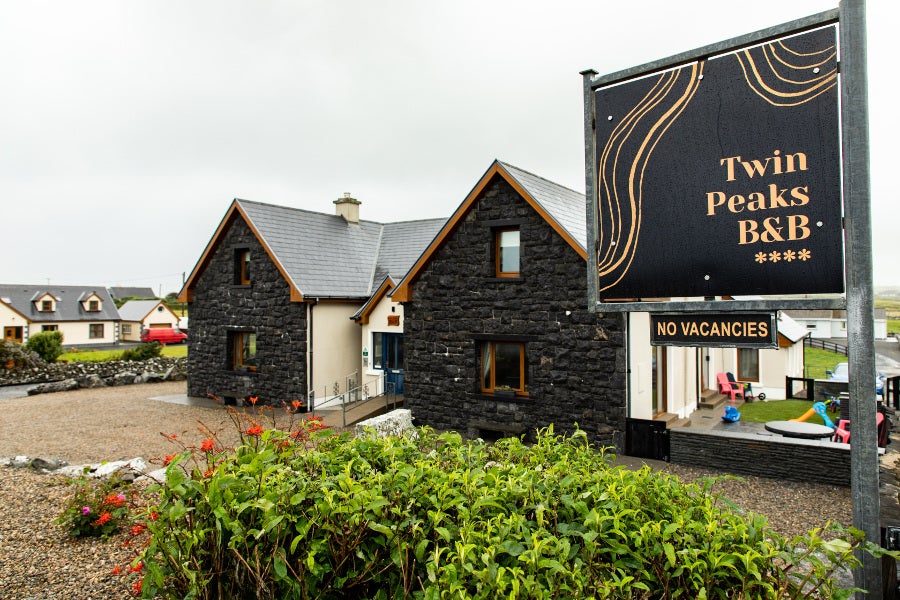 Exterior of house with stone frontage