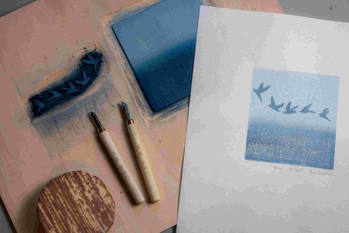 Mokuhanga Japanese Woodblock Printing with Ann Kavanagh, looking down on a table with print instruments and a finished art work.