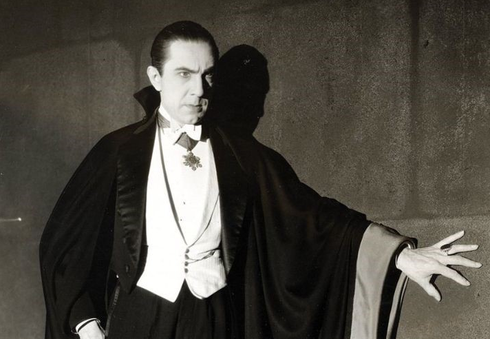 Old photo of man looking cross, dressed in formal evening dress