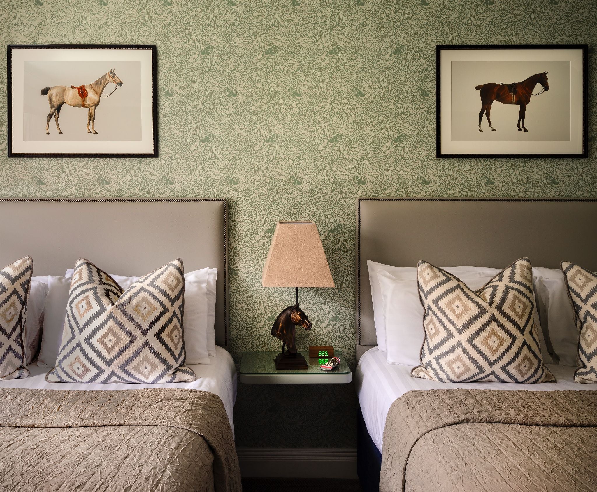 Twin bedroom with white and cream sheets