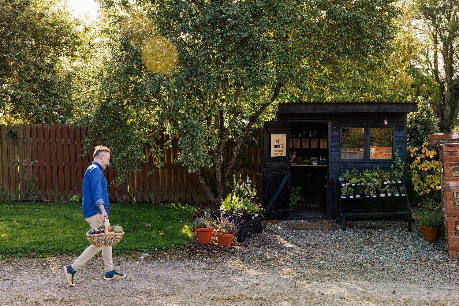 An exterior view of the honesty farm shop at Fat Tomato