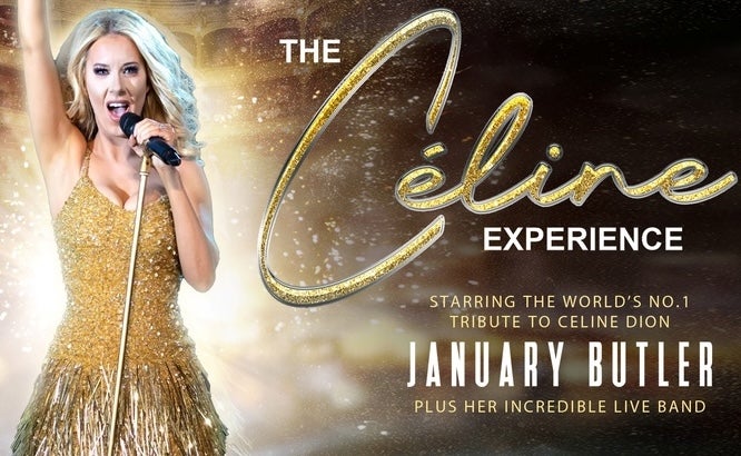 A woman in gold dress singing into handheld mic with one arm straight up in the air