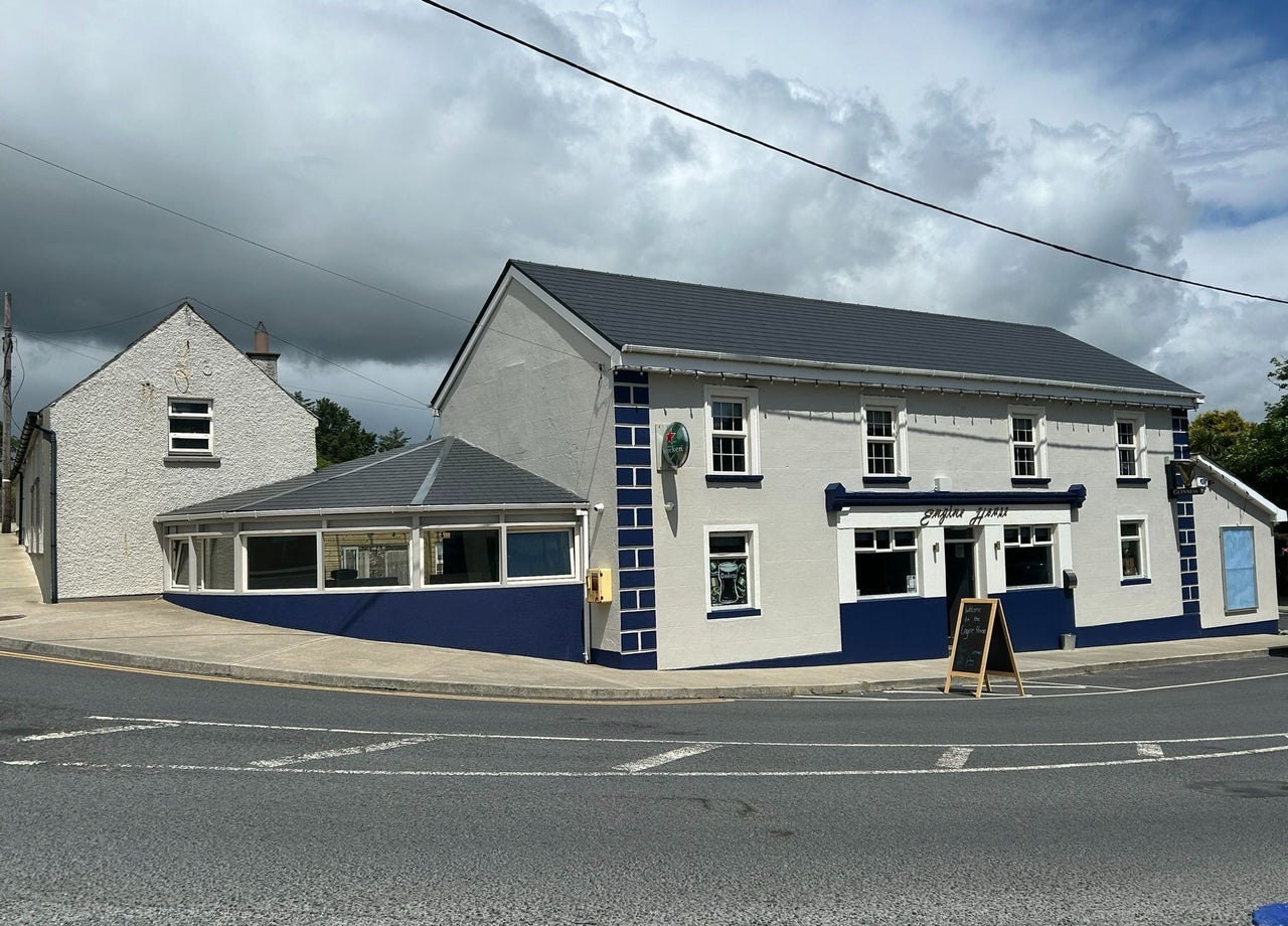 Exterior of a pub and restaurant on a quiet street