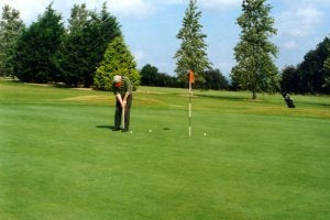 A man putting at Boyle Golf Club