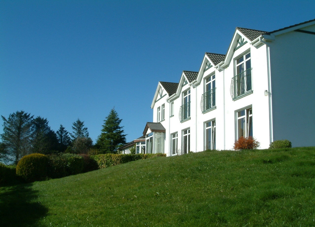 Side view of house and garden