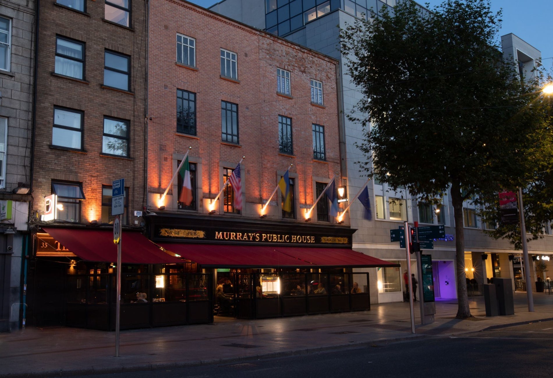 An exterior street view of Murray's Bar & Grill