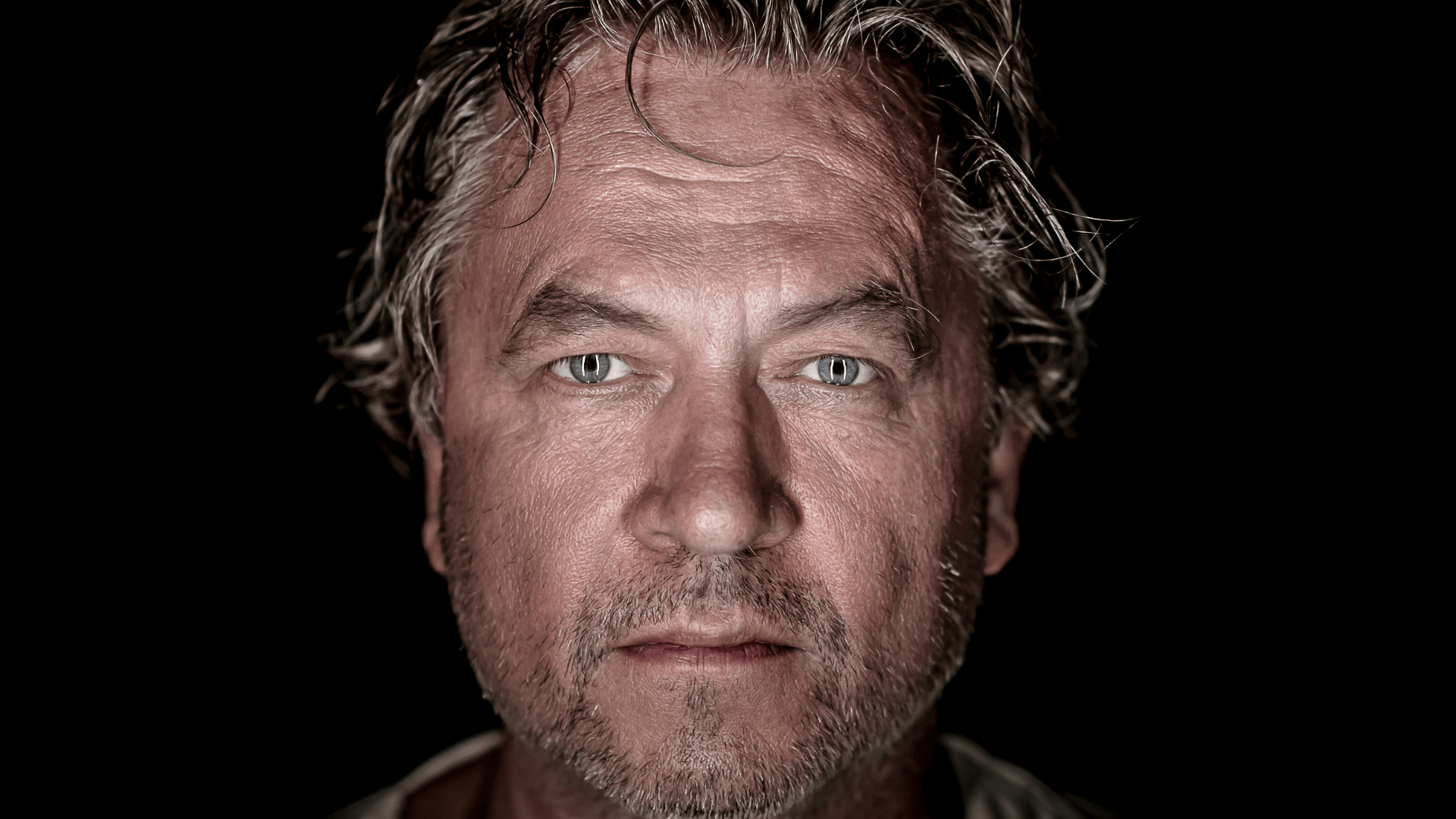 Nils Petter Molvaer in a black void.